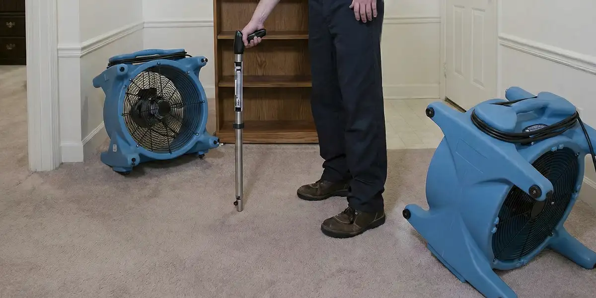 emergency water removal equipment deployed to dry a flooded residential interior in Oakland, CA