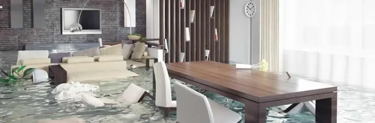 home interior affected by water damage with flooded floors and displaced furniture in Oakland, CA